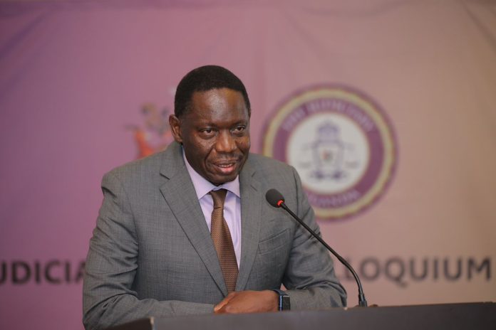 BOU Governor Atingi-Ego Flags Shs2 Trillion tied in Disputes, Calls for Faster Resolution of Banking Cases